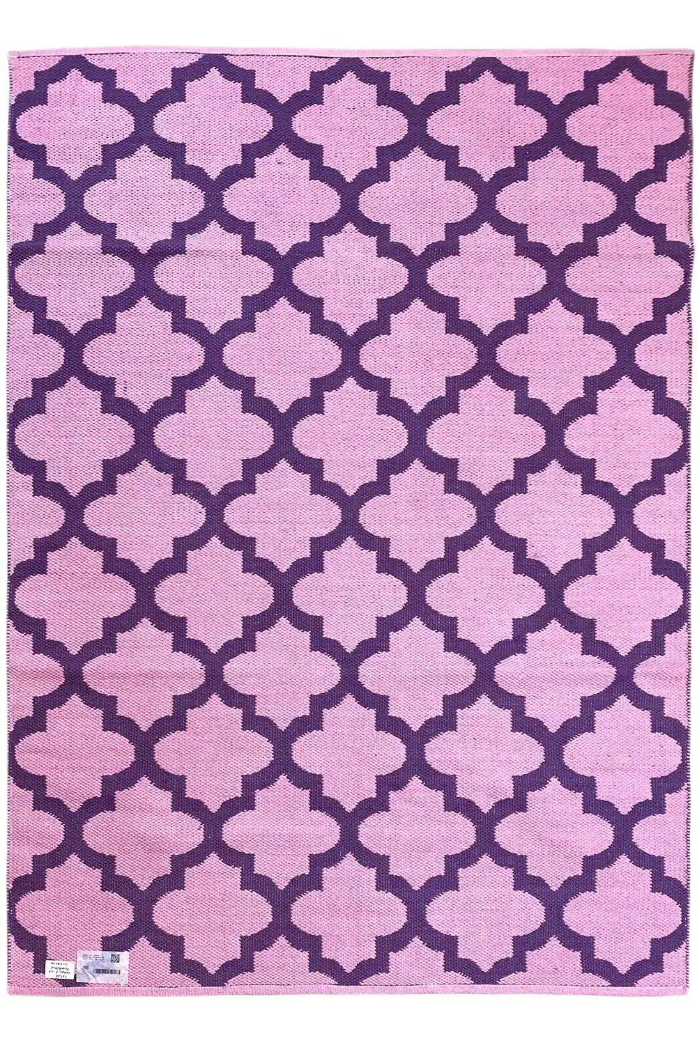 Rectangular rug with purple and pink clover patterns, clear contrast