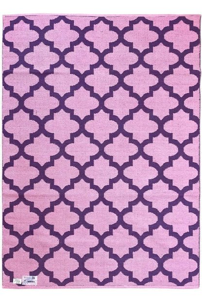 Rectangular rug with purple and pink clover patterns, clear contrast