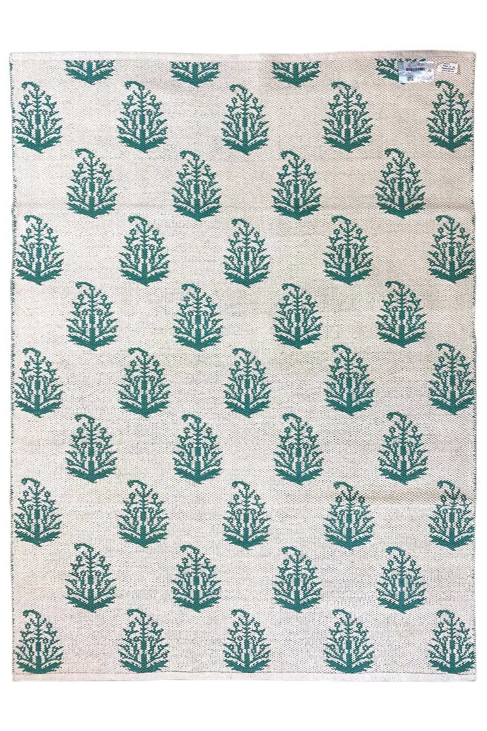 Modern kilim rug with a beige base and green tree pattern, rectangular