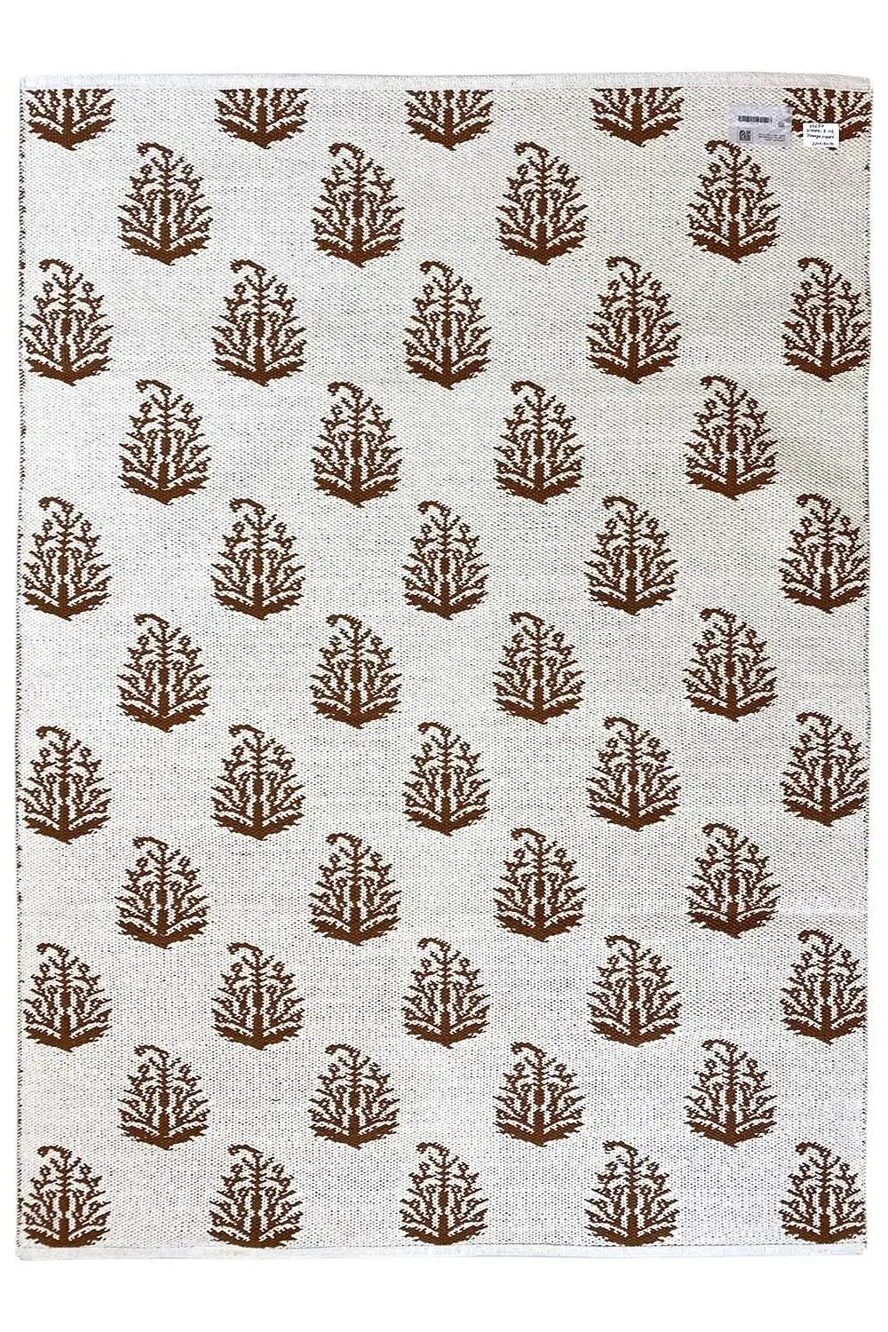 Ecru-colored kilim with brown tree motifs in an all-over design