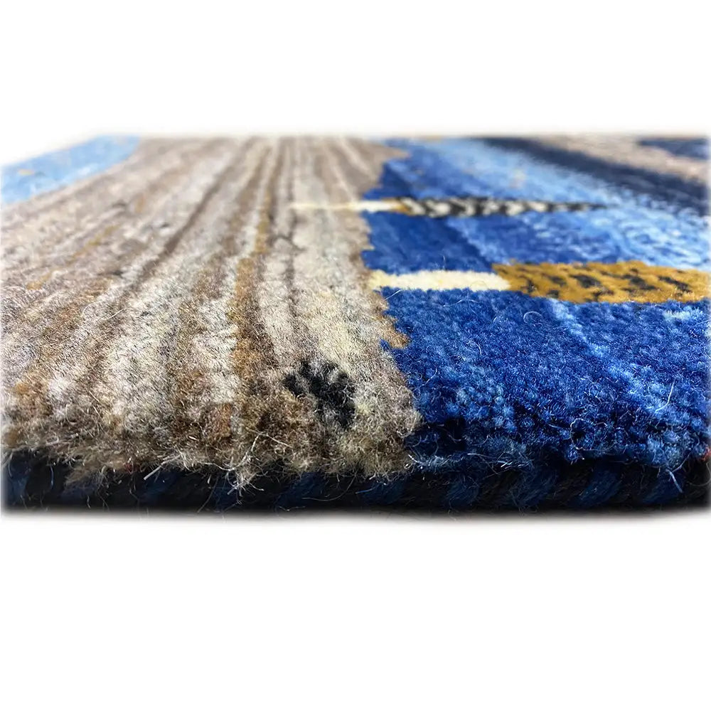 Gabbeh runner rug with visible selvedge and fringes, blue-beige