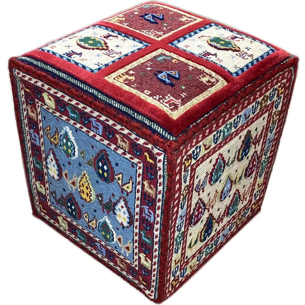 Soumak rug with a blue side field, red border, and symmetrical motifs.