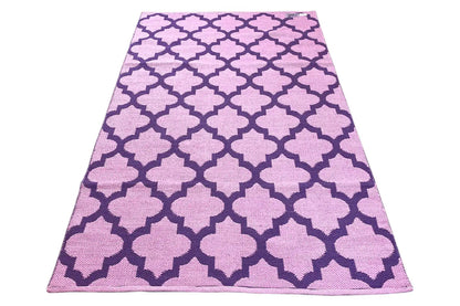 Kelim in a triangular design, purple background with light quarter quatrefoil and cross-shaped mosaic patterns