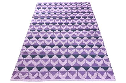 Rectangular purple kilim with diamond and triangular ornaments in the pattern