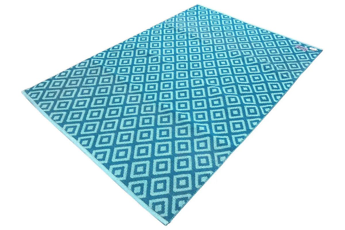 Blue kilim with a uniform square grid pattern in light blue