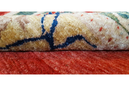 Carpet fiber detail: patterned pile over a red ground with a blue ornament
