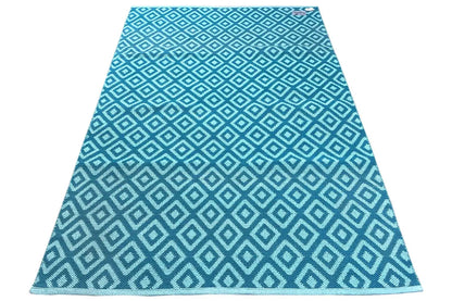 Modern blue kilim rug with a geometric diamond pattern