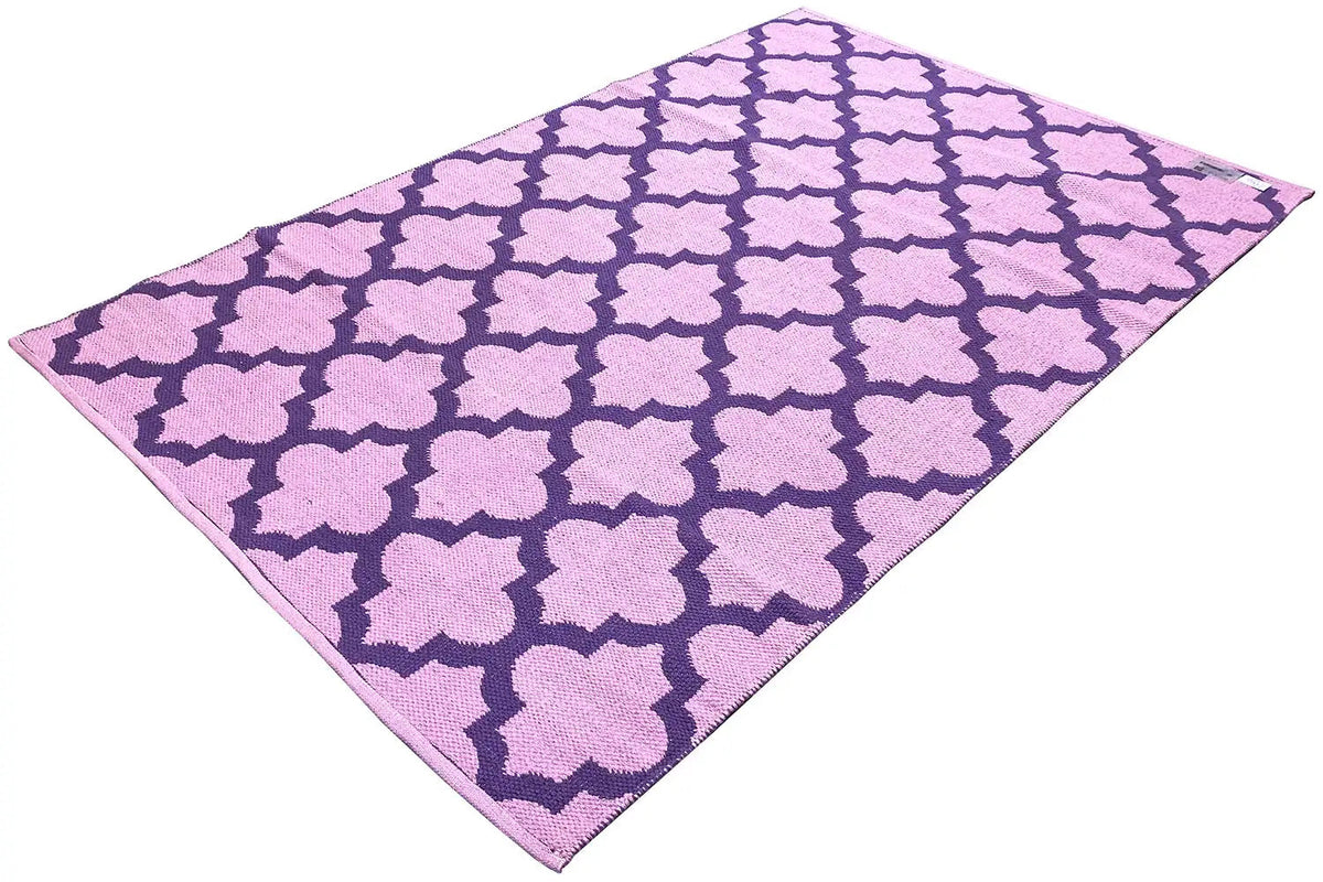 Modern purple kilim with a patterned clover design, rectangular