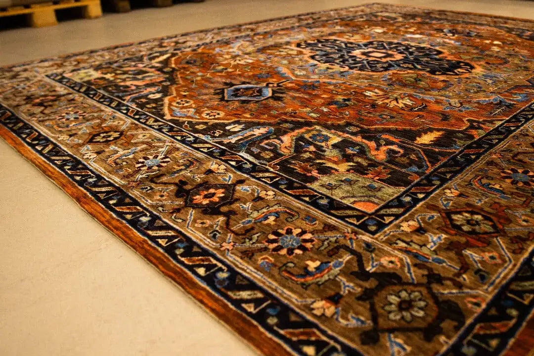 Ornamental rug with a multicolored pattern, dark central medallion, and border