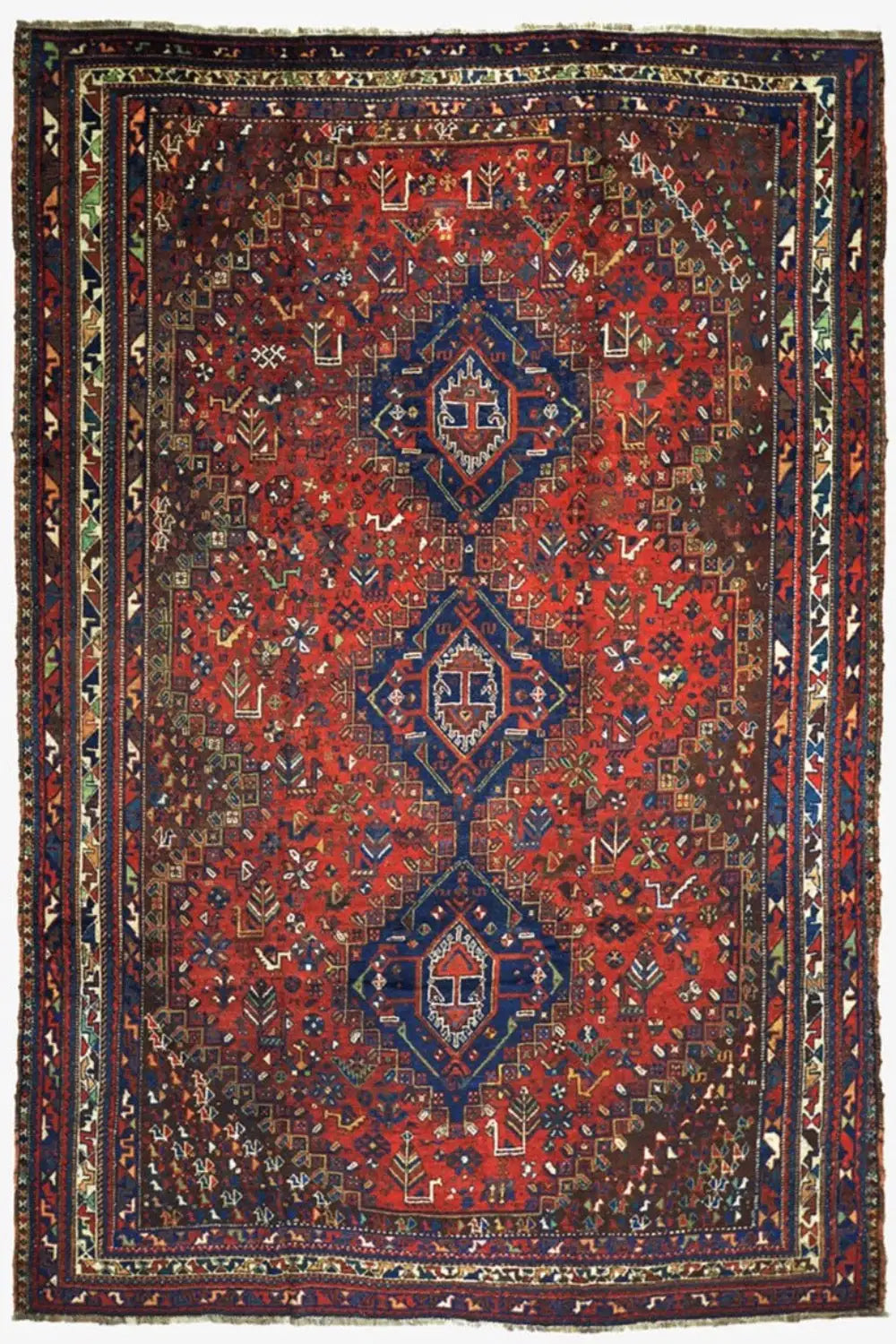Oriental rug with a dark red pattern and multicolored ornaments, bordered in a rectangle