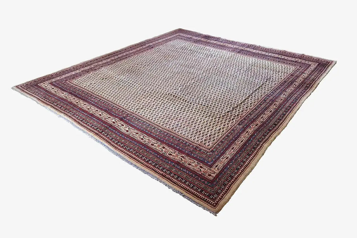 Rug with borders in blue, red, and beige, 315x280 cm
