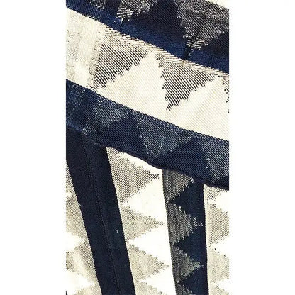 Jajim rug detail: muted blue and beige tones in a block-stripe design