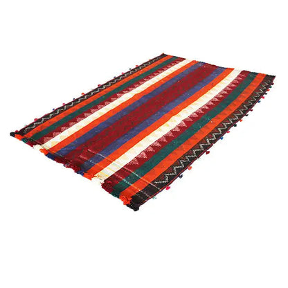 Jajim rug viewed diagonally, multicolored stripes with black fringed edging