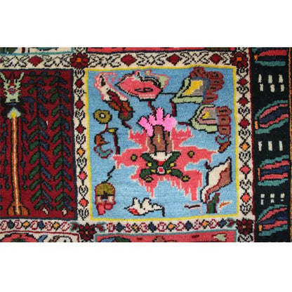 Rectangular rug with colorful medallions and patterned panels, close-up of the surface