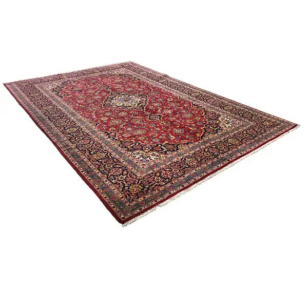 Keshan rug in red with an ornamental medallion and multicolored border, rectangular