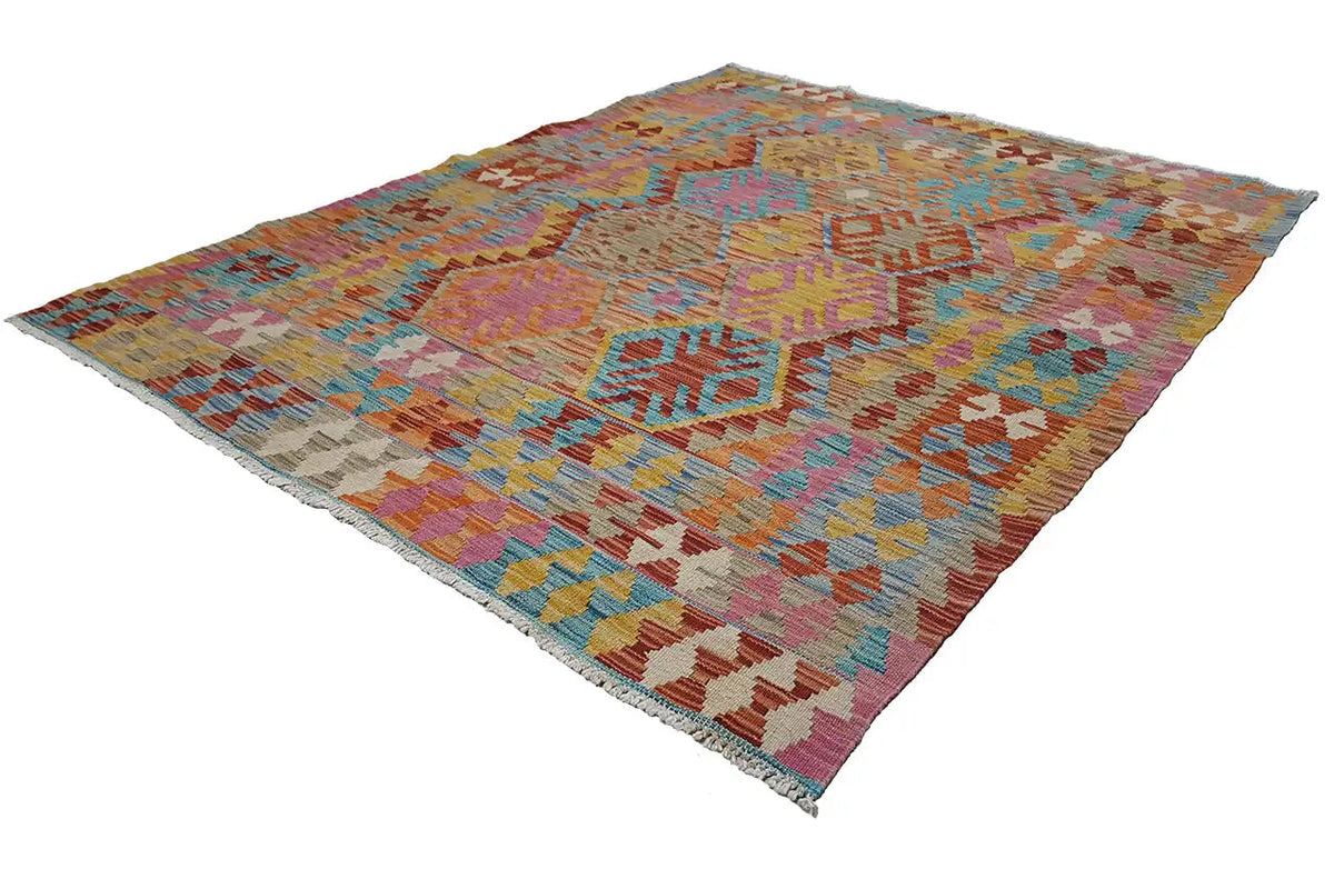 Kilim rug in diagonal view, colorful geometric mosaic pattern