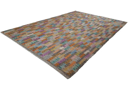 Kilim rug in three-quarter view, multicolored zigzag design