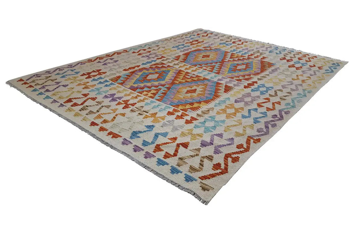 Rectangular kilim rug with diamond and zigzag patterns in orange, blue, and purple.