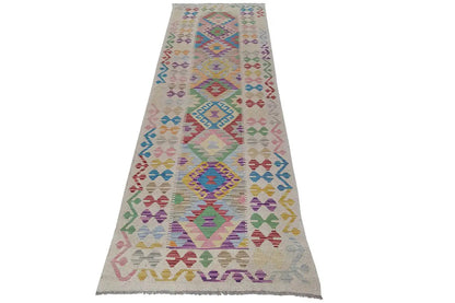 Afghan kilim runner with geometric diamonds in vibrant colors, rectangular