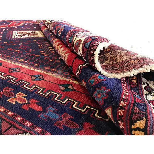 Sirjan rug with a dense pattern, blue-red, visible pile and edges