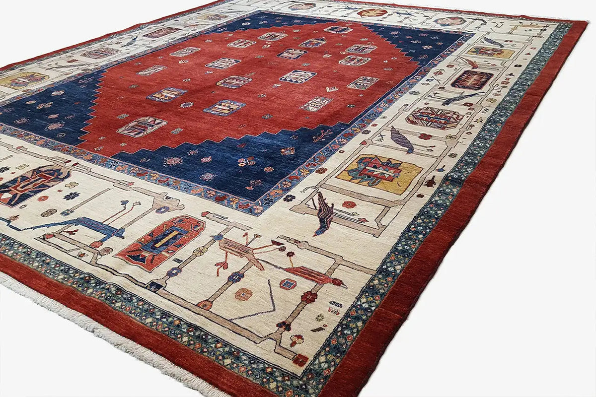 Oriental rug: red field with a dark blue edge and border, classic pattern