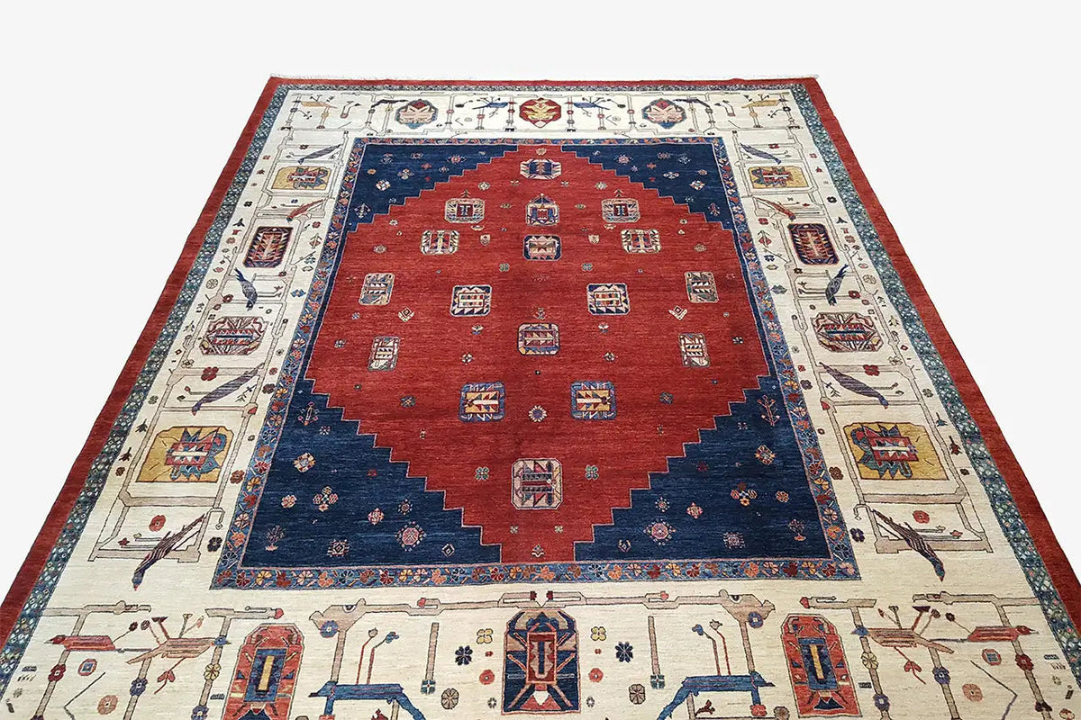 Oriental rug laid flat, red center, dark blue frame, ornate border