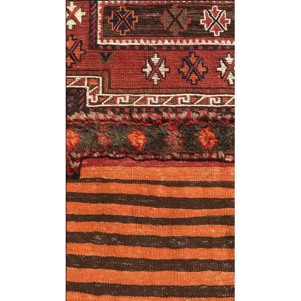 Bakhtiari kilim (238 x 90 cm) with decorative panels, stars, and dense stripes in red and blue