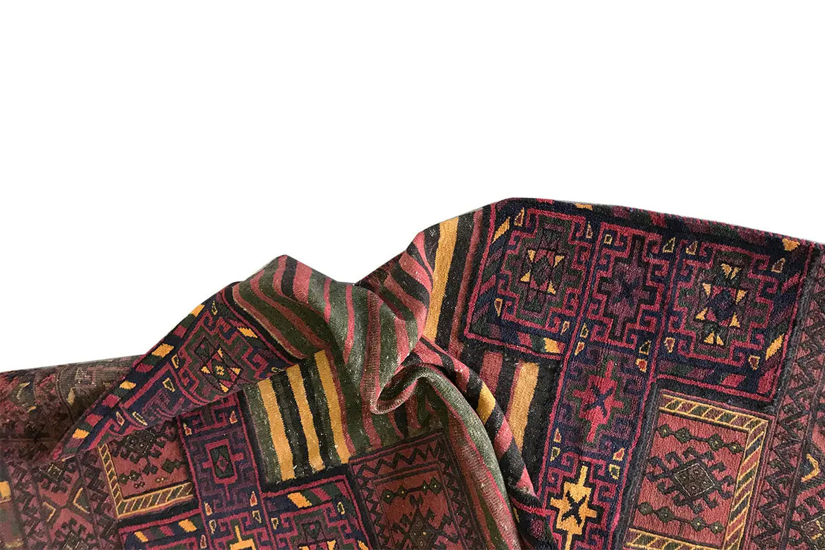 Bakhtiari kilim detail on the folded edge with patterned fields and contrasting lines