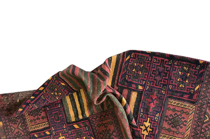 Bakhtiari kilim detail on the folded edge with patterned fields and contrasting lines