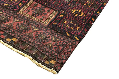 Corner of the Bakhtiari kilim with tightly woven patterns and a bound edge with fringes