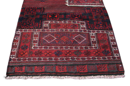Bakhtiari kilim rug, red-and-blue geometric patterns with decorative border, fringed edges.