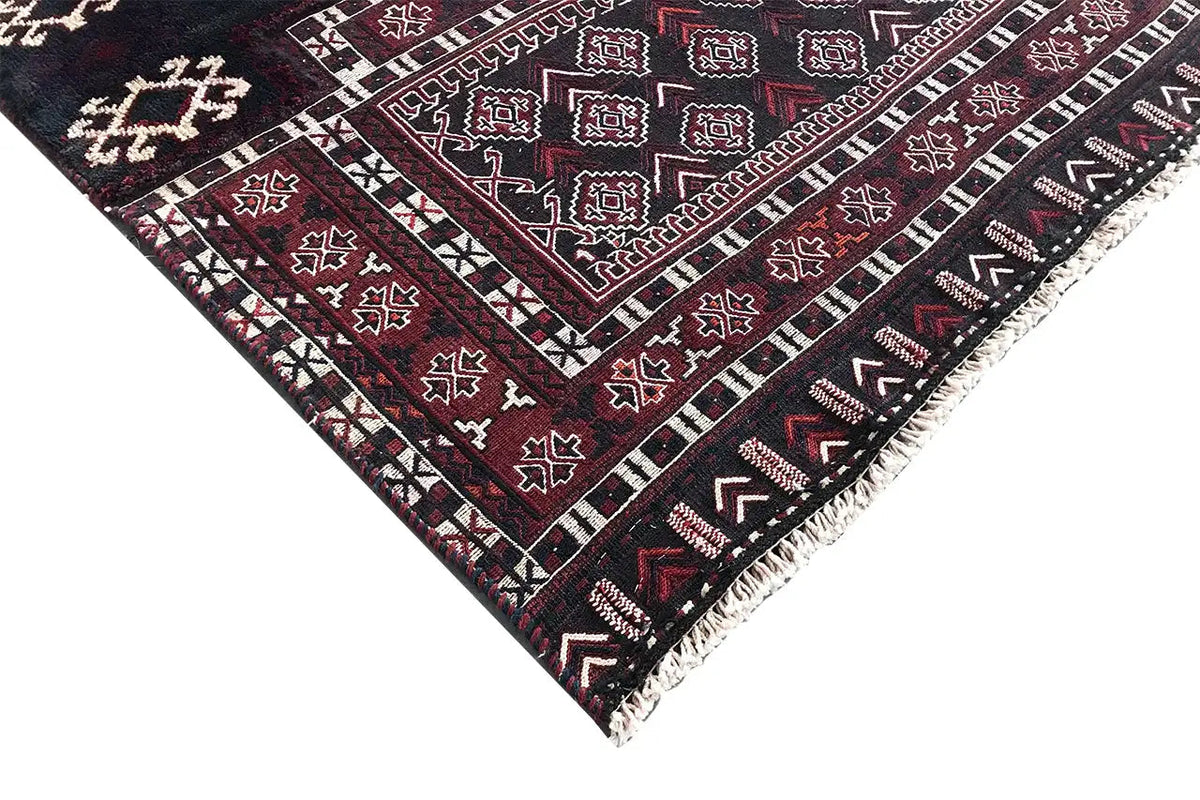 Bakhtiari kilim rug: diagonal pattern with diamonds and zigzags, burgundy and dark.