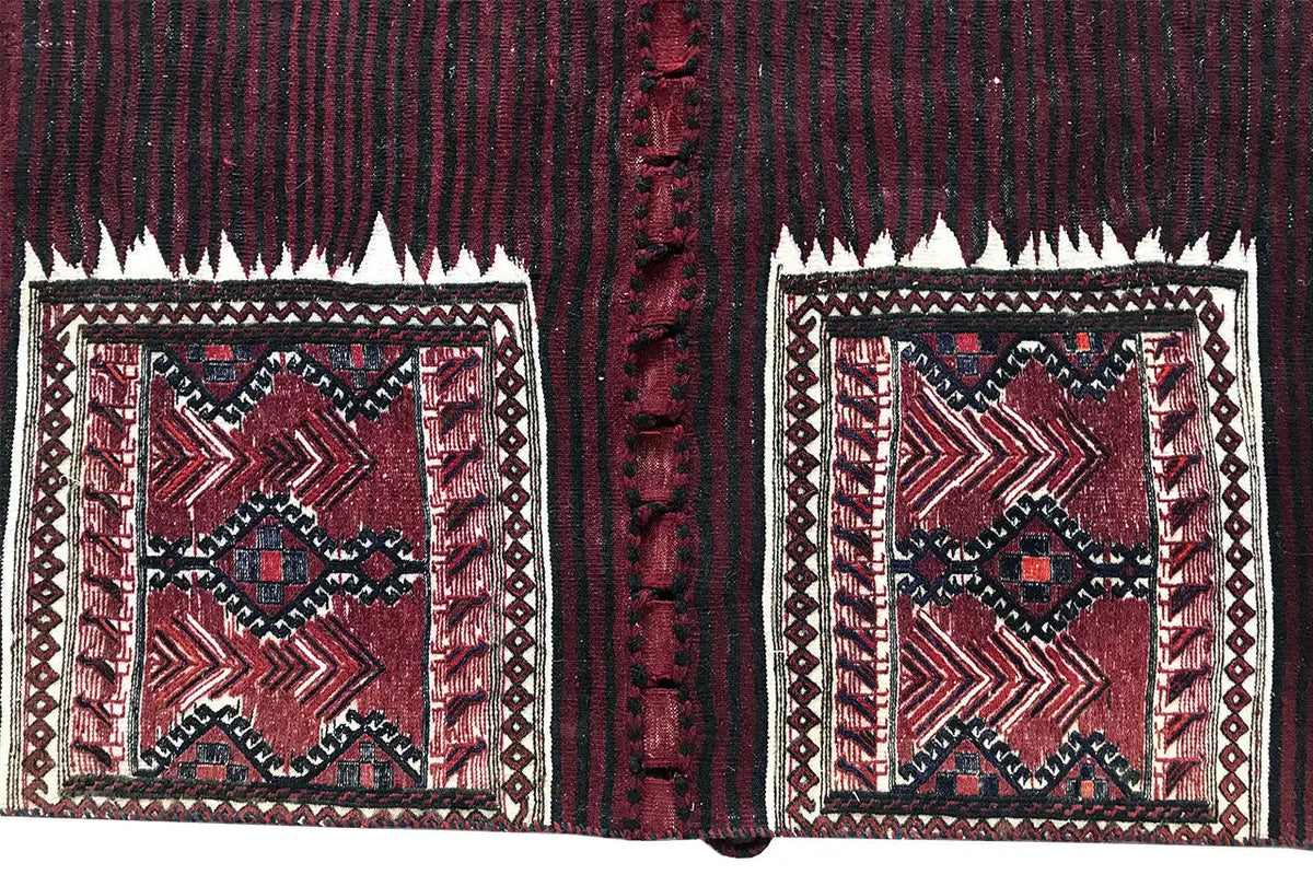 Bakhtiari kilim rug: two squares in a diamond pattern, dark stripes, and burgundy accents.