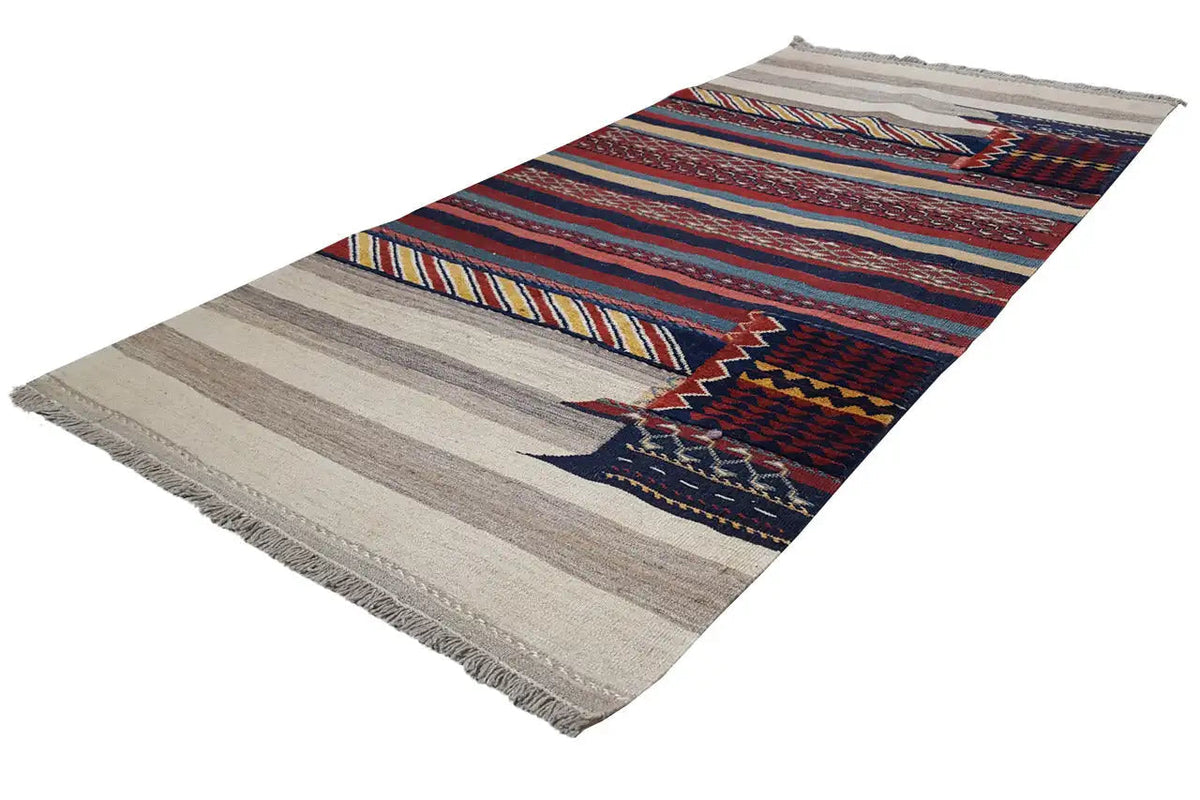 Kilim rug with zigzag and stripe patterns in blue, red, and beige, fringes