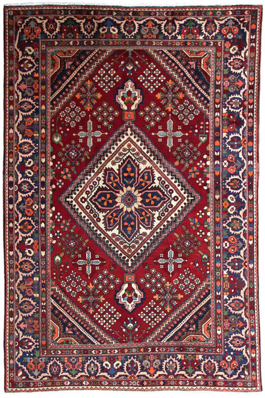 Oriental rug with a red ground and multicolored ornamental medallion, rectangular with a border