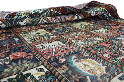 Folded Oriental rug with a visible texture and colorful ornamental design