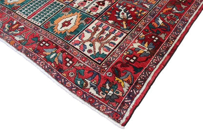 Oriental rug corner with colorful motifs and a bound edge, 315×220 cm