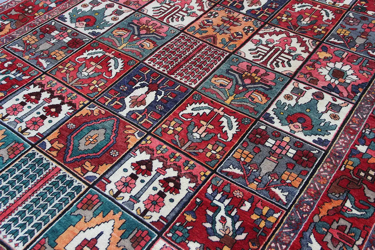 Oriental rug front side with colorful geometric ornamental fields, 315×220 cm
