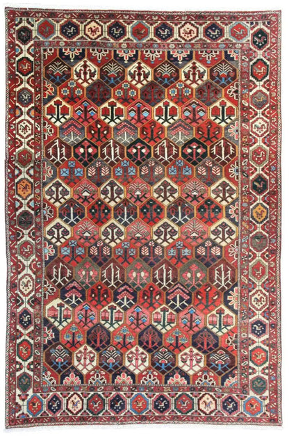 Bakhtiari rug (312x210 cm) with a geometric pattern, shades of red and blue, decorative border