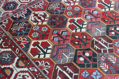 Bakhtiari rug (312x210 cm), pattern detail with hexagon and arrow motifs, red-blue-beige