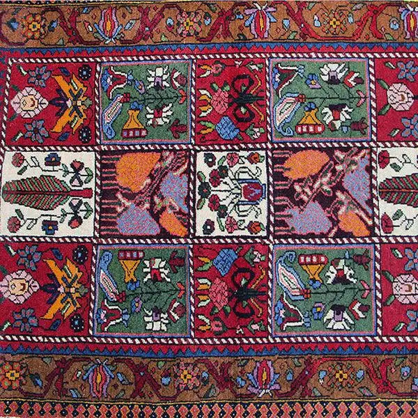 Bakhtiari rug, square patterned fields in red, blue, green and white