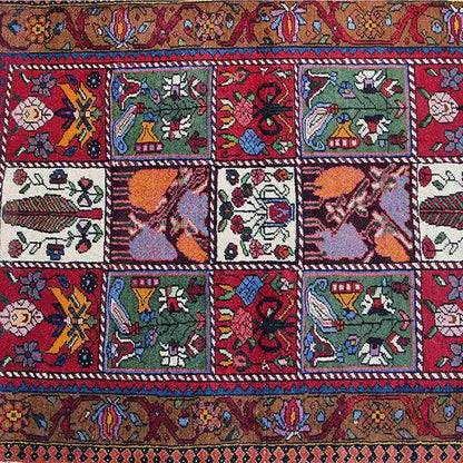 Bakhtiari rug, square patterned fields in red, blue, green and white