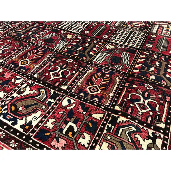 Bakhtiari Oriental rug close-up: geometric fields, zigzag and diamond ornaments