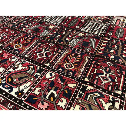 Bakhtiari Oriental rug close-up: geometric fields, zigzag and diamond ornaments