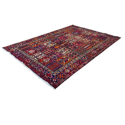 Rug 310x209 cm with a geometric patchwork design in dark burgundy and blue