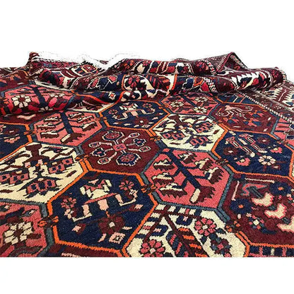 Persian rug with braided texture and colorful pattern, red, blue, cream
