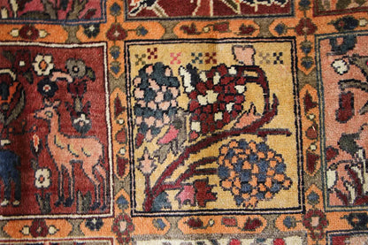 Oriental rug with borders and floral medallions in red, blue, and beige
