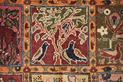 Oriental rug with ornate medallions and birds in red, beige, and blue