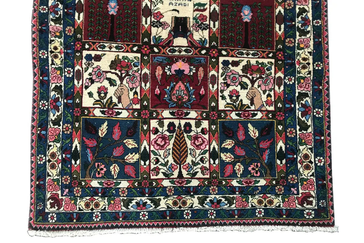 Oriental rug with a square central motif and surrounding border pattern.