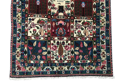 Oriental rug with a square central motif and surrounding border pattern.